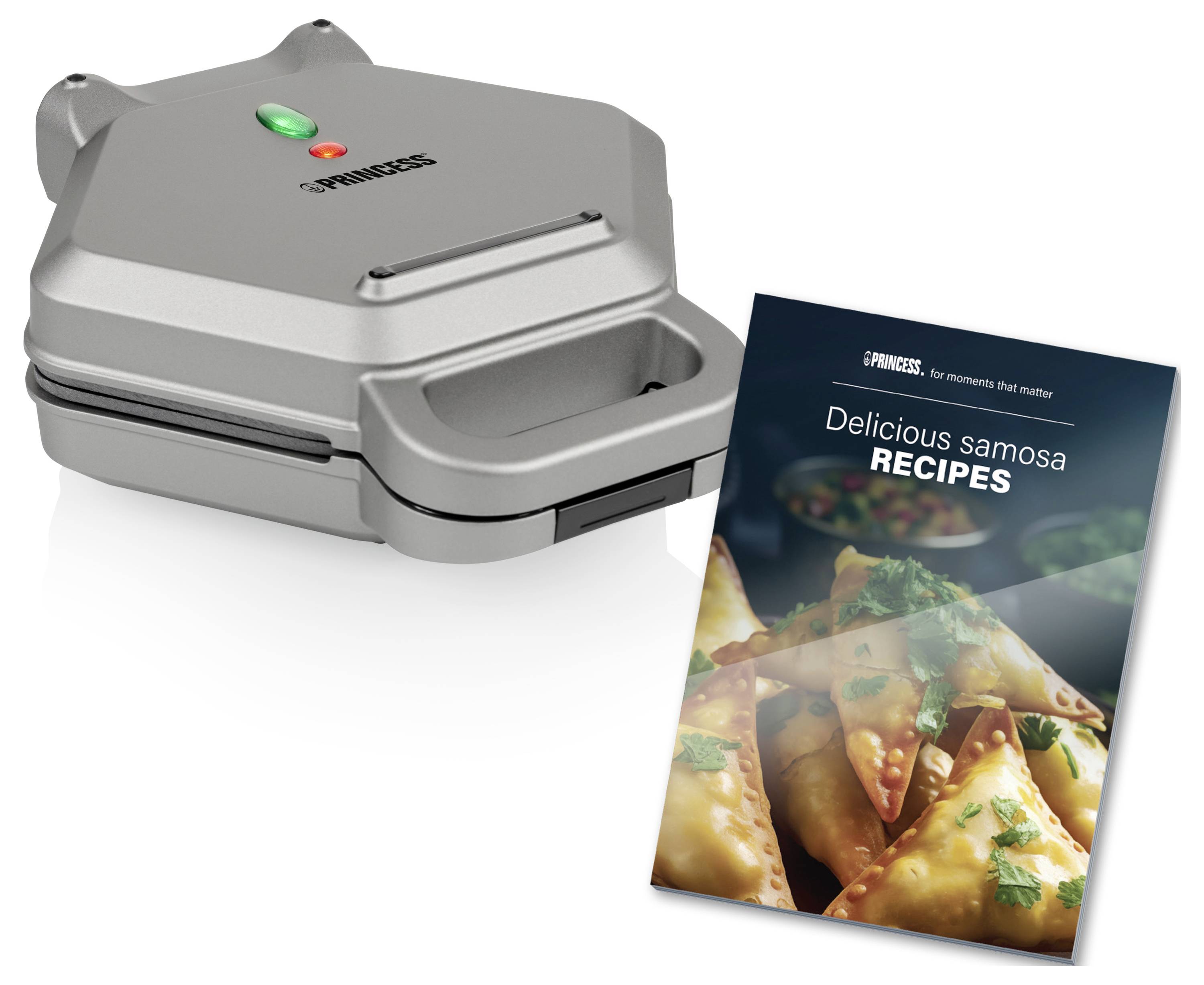 Un fer à gaufres électrique à côté d'un livre de recettes intitulé « Délicieuses RECETTES de samosas ». L'accent est mis sur l'appareil de cuisine et le thème.
