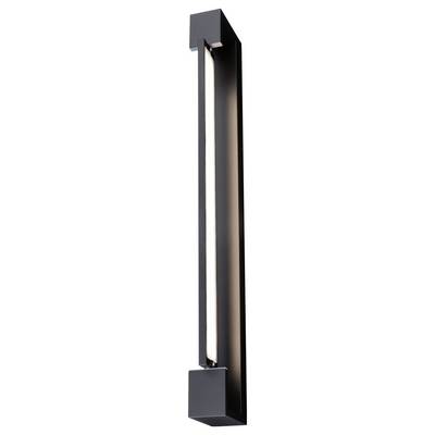 Une applique murale étroite, noire, au design minimaliste, montée verticalement. Elle émet une lumière dirigée vers l'intérieur.