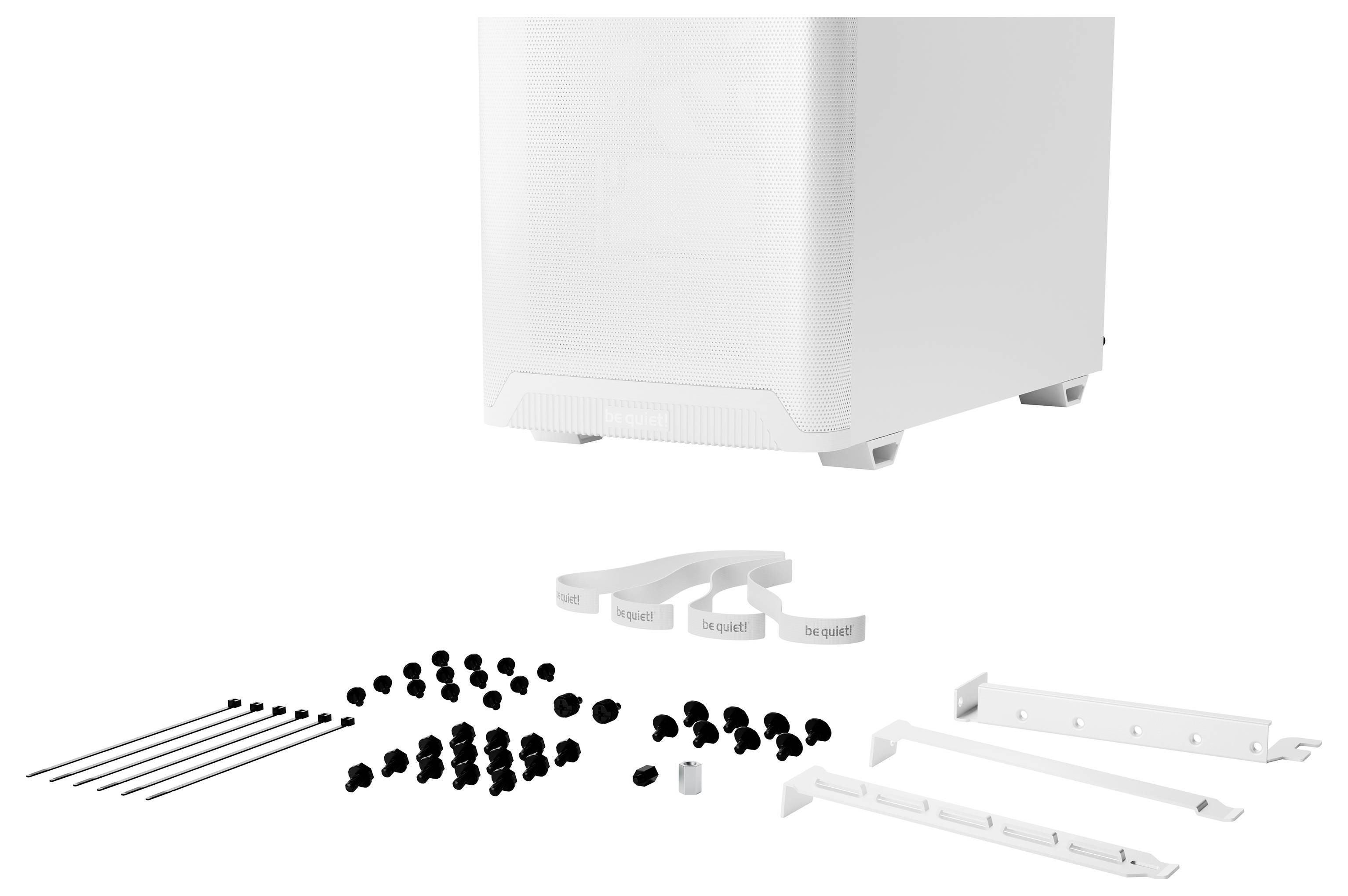 Dos d'un boîtier d'ordinateur blanc avec de nombreux serre-câbles, vis et accessoires sur un fond blanc.