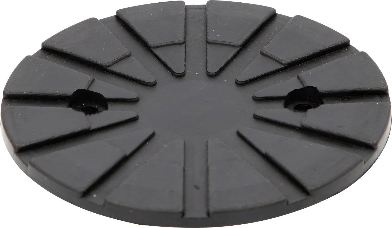 Disque rond en caoutchouc noir avec des rainures, deux petits trous, posé à plat sur un fond blanc.