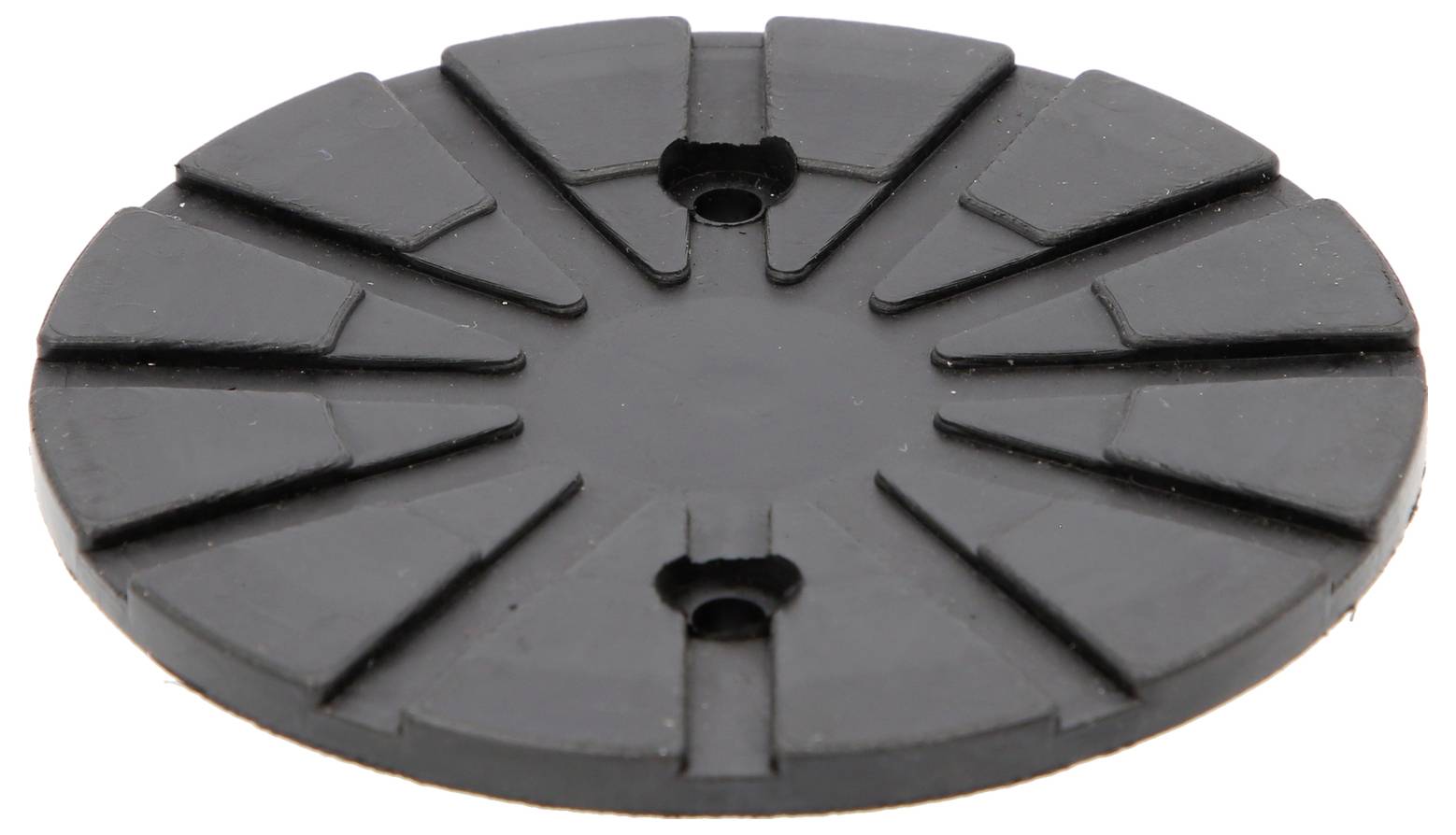 Tapis de caoutchouc noir, rond, avec un motif de rainures et deux ouvertures de fixation centrales, probablement un tampon de protection contre les chocs ou un pad antidérapant.