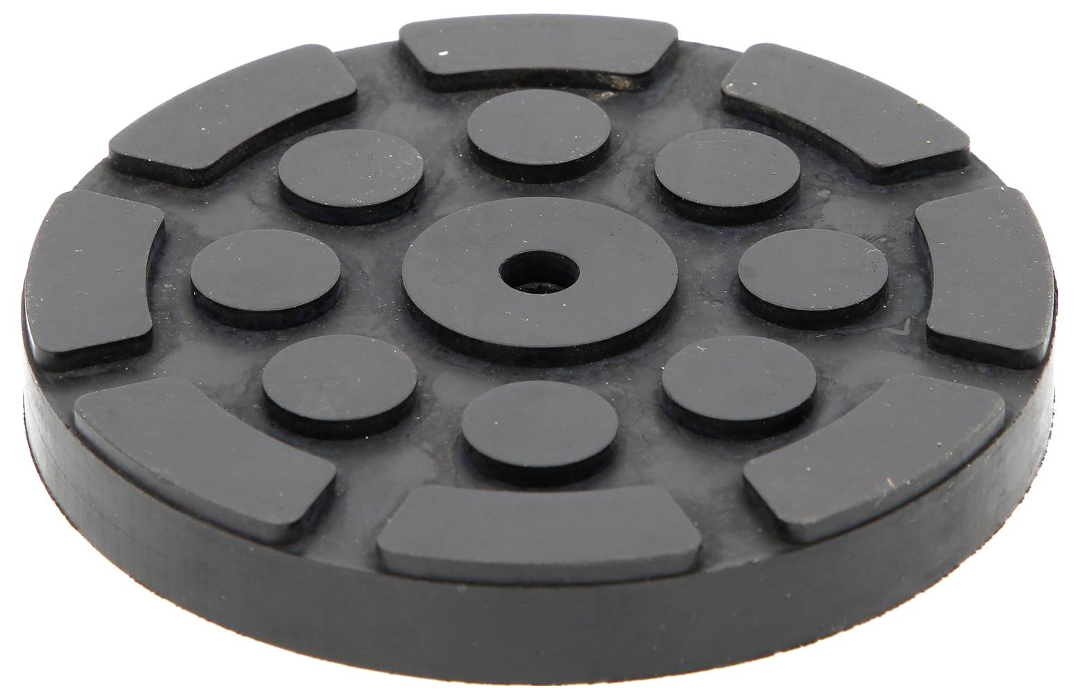 Disque de caoutchouc noir et rond comportant plusieurs zones surélevées symétriquement disposées sur sa surface supérieure.
