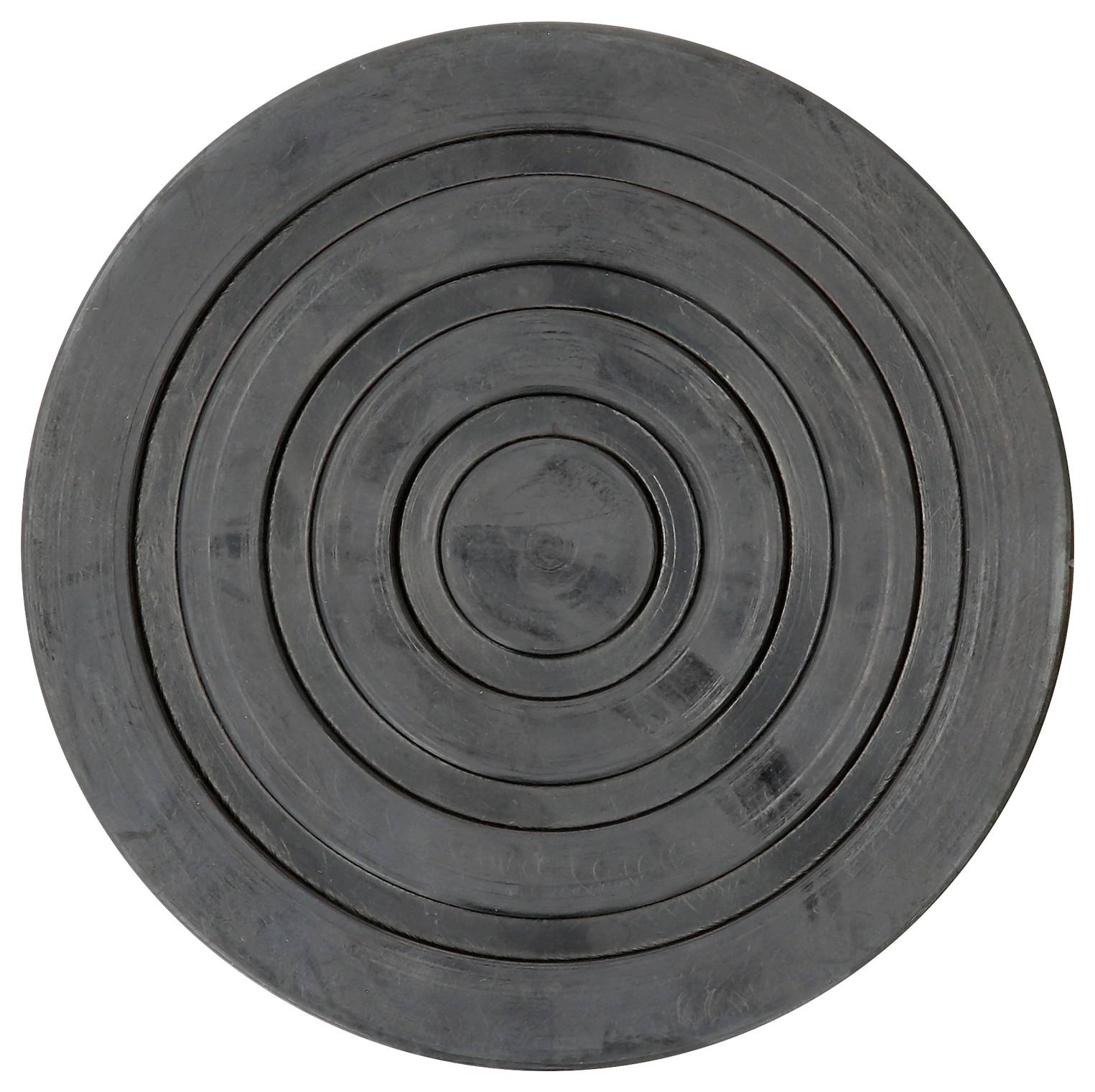 Un tapis anti-vibration rond et noir avec plusieurs cercles concentriques destiné à réduire les vibrations ou les bruits.