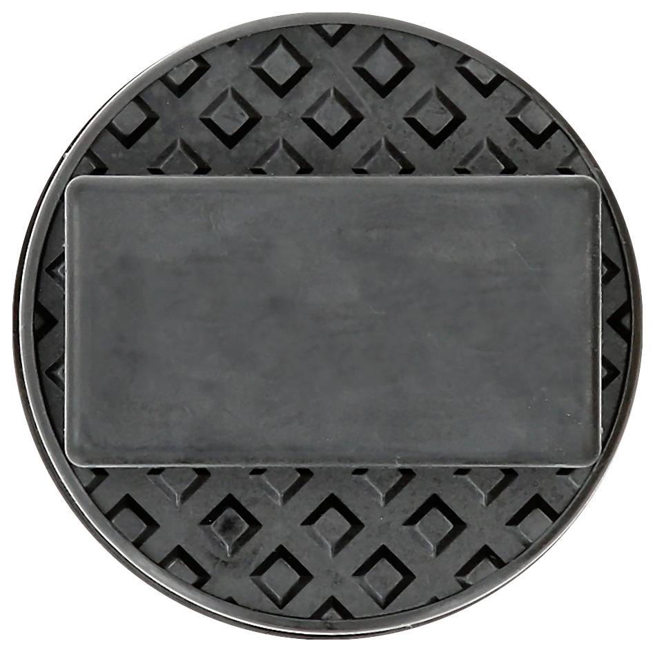 Une plaque métallique noire ronde avec une zone centrale rectangulaire et lisse, et un motif de petits carrés sur le pourtour.