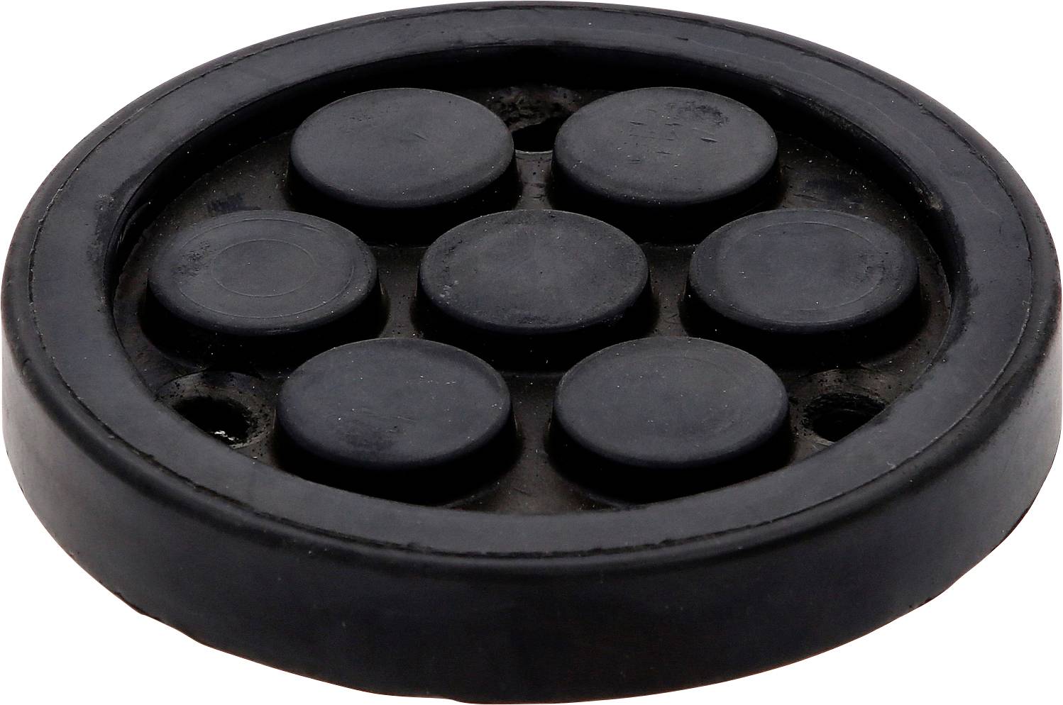 Un bouchon rond en caoutchouc noir, présentant sept anneaux en relief, disposés de manière symétrique.