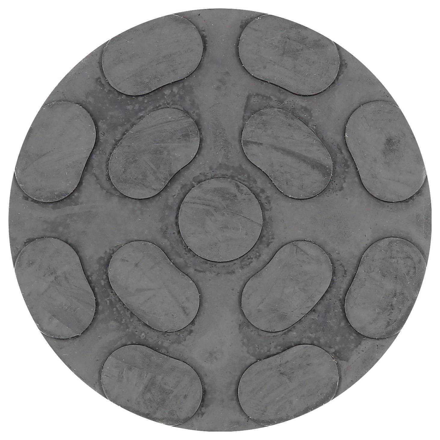 Une structure ronde, grise, caoutchouteuse avec des motifs ovales en relief sur sa surface.
