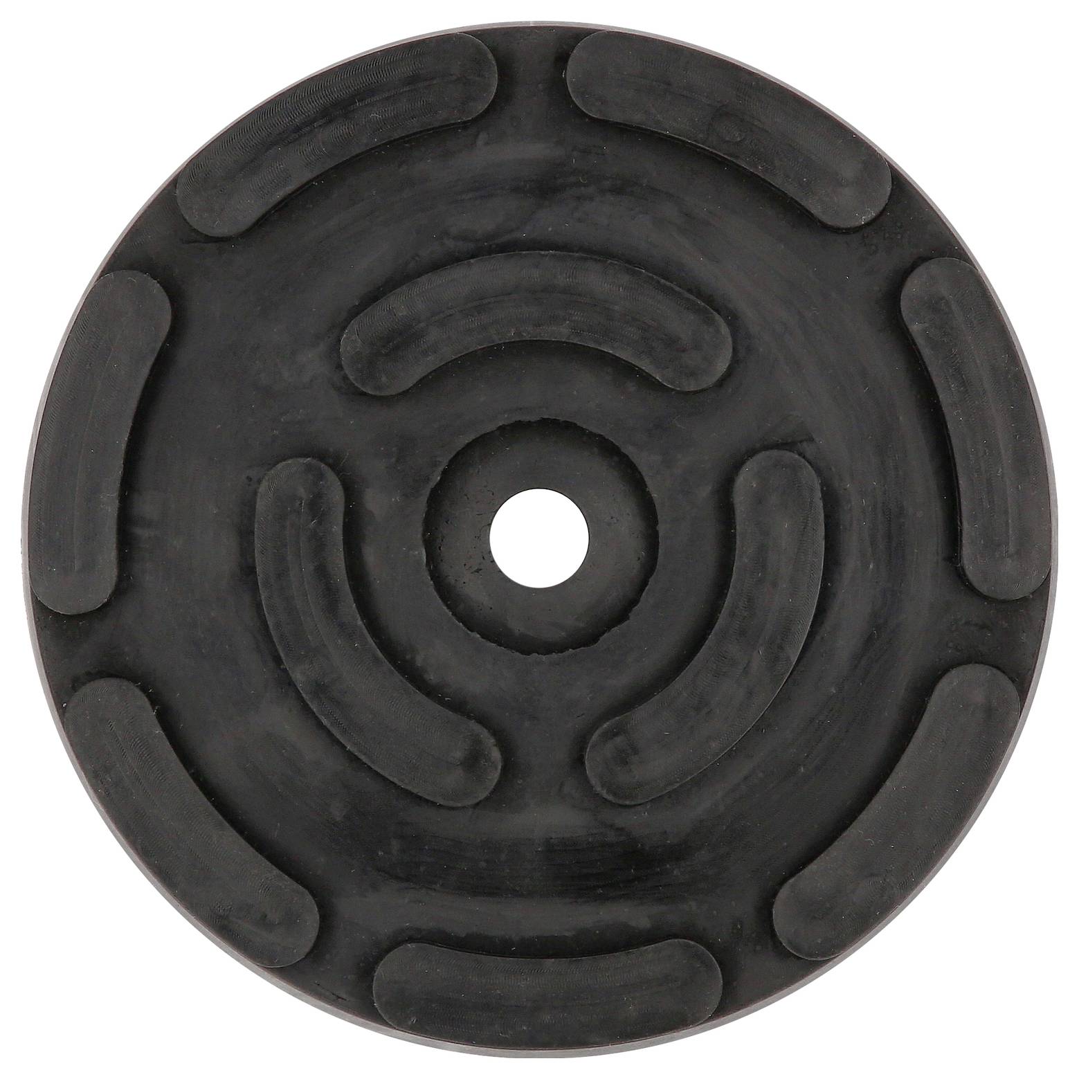 Pad rond en caoutchouc noir avec des rainures arrondies disposées en motif circulaire, centré avec un trou au milieu.