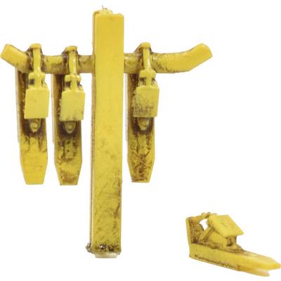 Un appareil métallique jaune avec trois supports verticaux et des crochets. À côté se trouve une pièce unique abaissée avec un crochet.