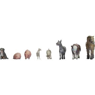 Petites figurines d'animaux en plastique alignées : chien, deux cochons, chèvre, âne, taureau et cheval, de gauche à droite.