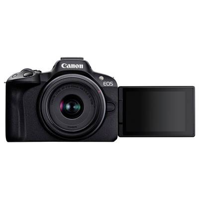 Appareil photo reflex numérique noir avec écran déplié. Objectif orienté vers l'avant, marque Canon visible.
