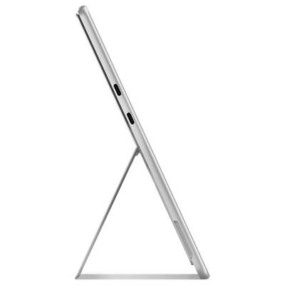 Une tablette de profil sur un support, montrant ses ports latéraux et son design élégant.