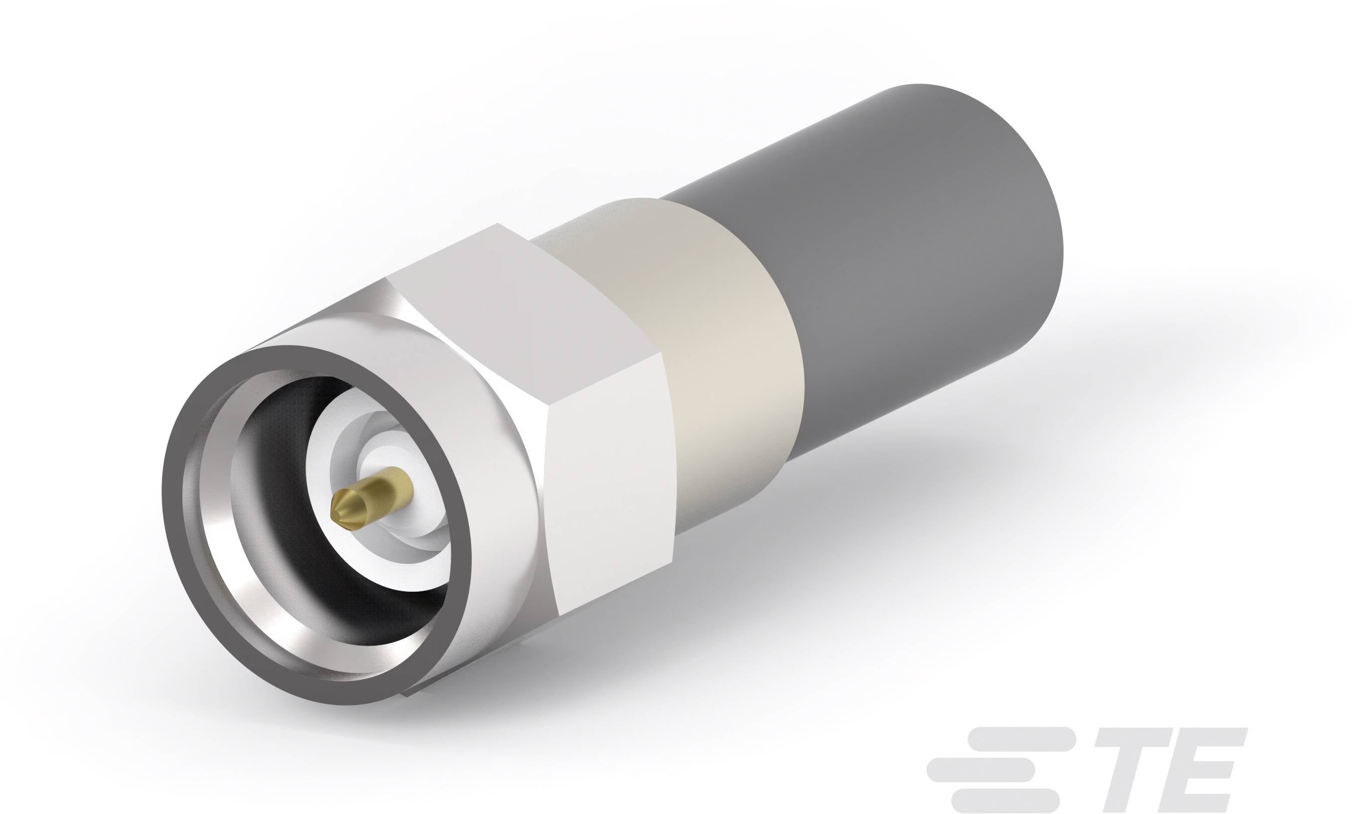 Un connecteur coaxial avec un manchon argenté et un câble noir. Logo de marque 'TE' dans le coin inférieur droit.