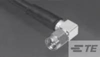Un connecteur RF métallique est représenté sur un câble. Le logo 'TE' se trouve dans le coin inférieur droit.