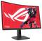 Un moniteur gaming incurvé à écran rouge affiche un robot de bande dessinée portant une tenue rouge et le logo 'ROG' accompagné du slogan 'Pour ceux qui osent'.