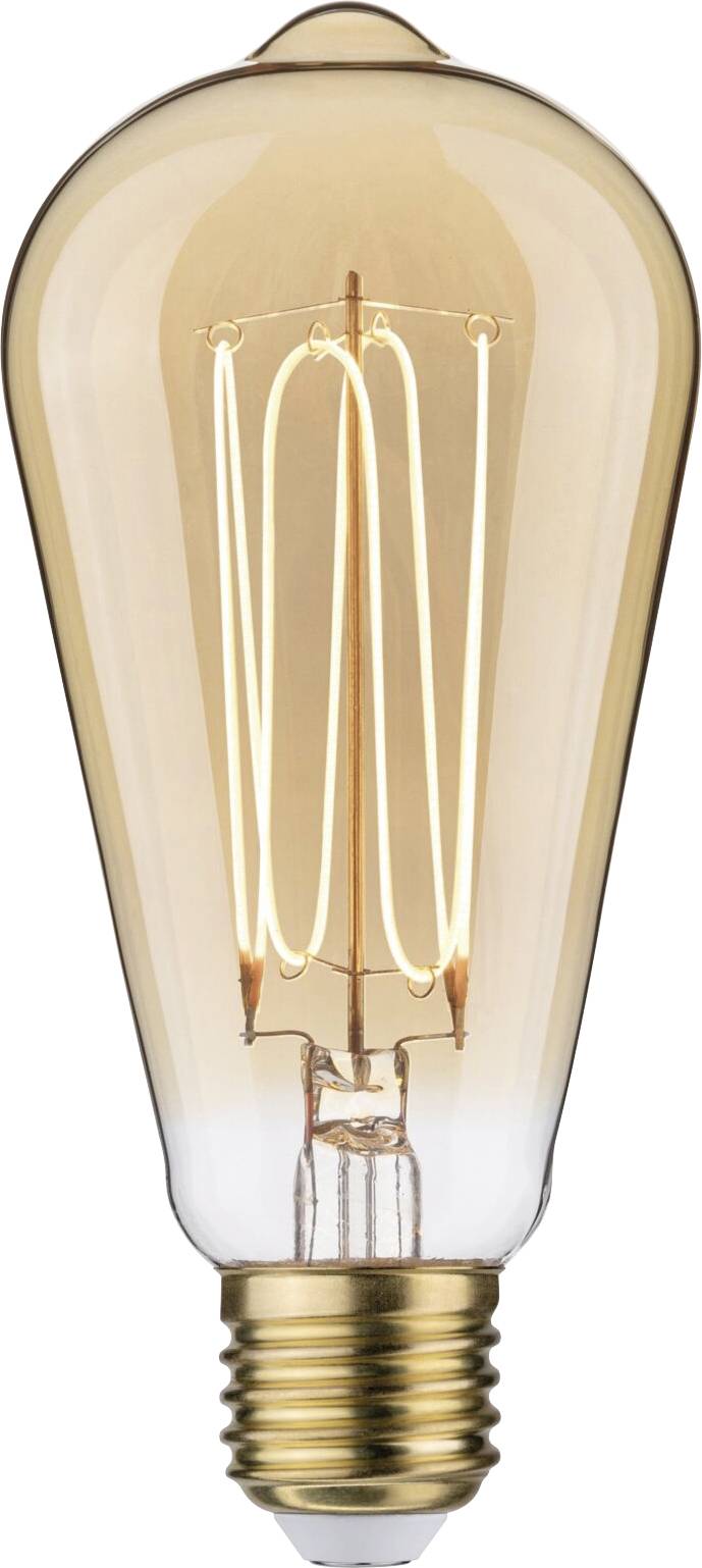 Ancienne ampoule à filament visible, émettant une lumière chaude.