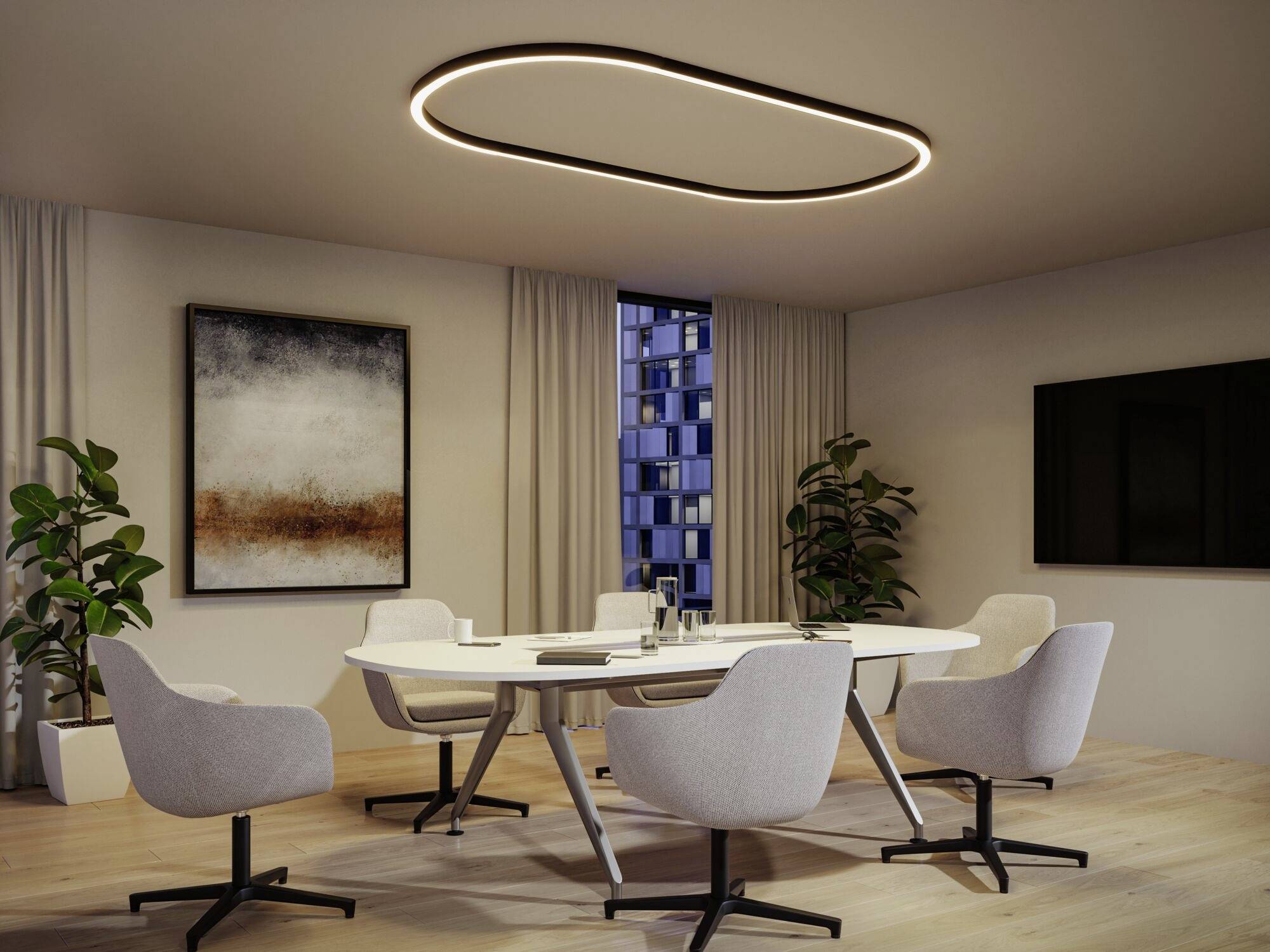 Six chaises blanches entourent une table de conférence ovale dans une salle de réunion moderne, bien éclairée, décorée d'œuvres d'art et de plantes.