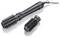 Sèche-cheveux noir avec embout de brosse interchangeable sur fond blanc. Adapté pour sécher et coiffer les cheveux.
