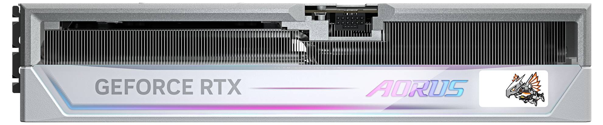 Carte graphique portant l'inscription 'GEFORCE RTX AORUS'. Une surface métallique froide avec un autocollant décoratif sur la droite.