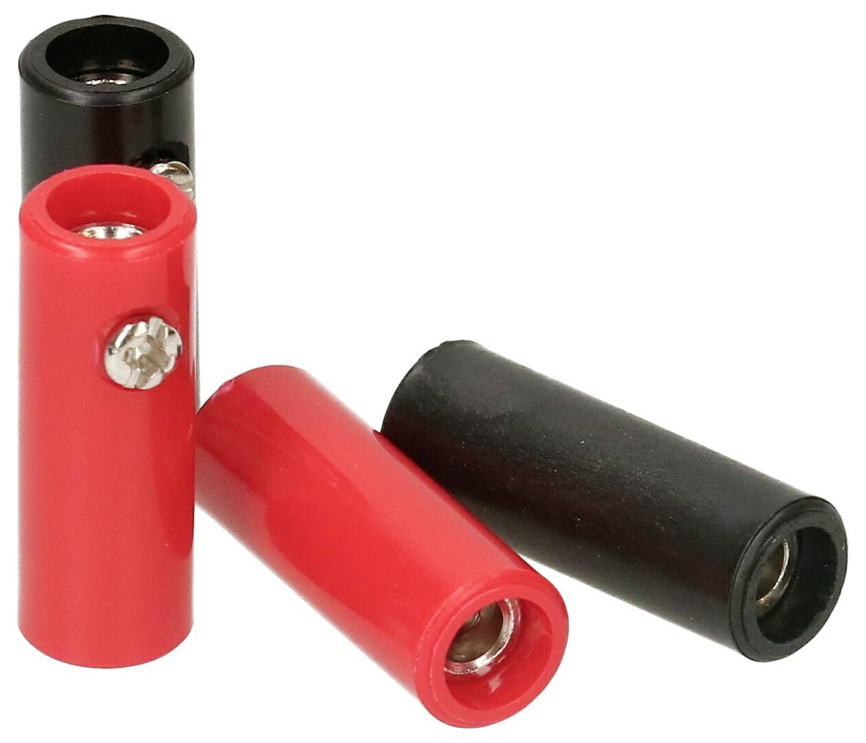 Deux fiches bananes, l'une rouge et l'autre noire, sont côte à côte. Elles sont souvent utilisées dans les circuits électriques.