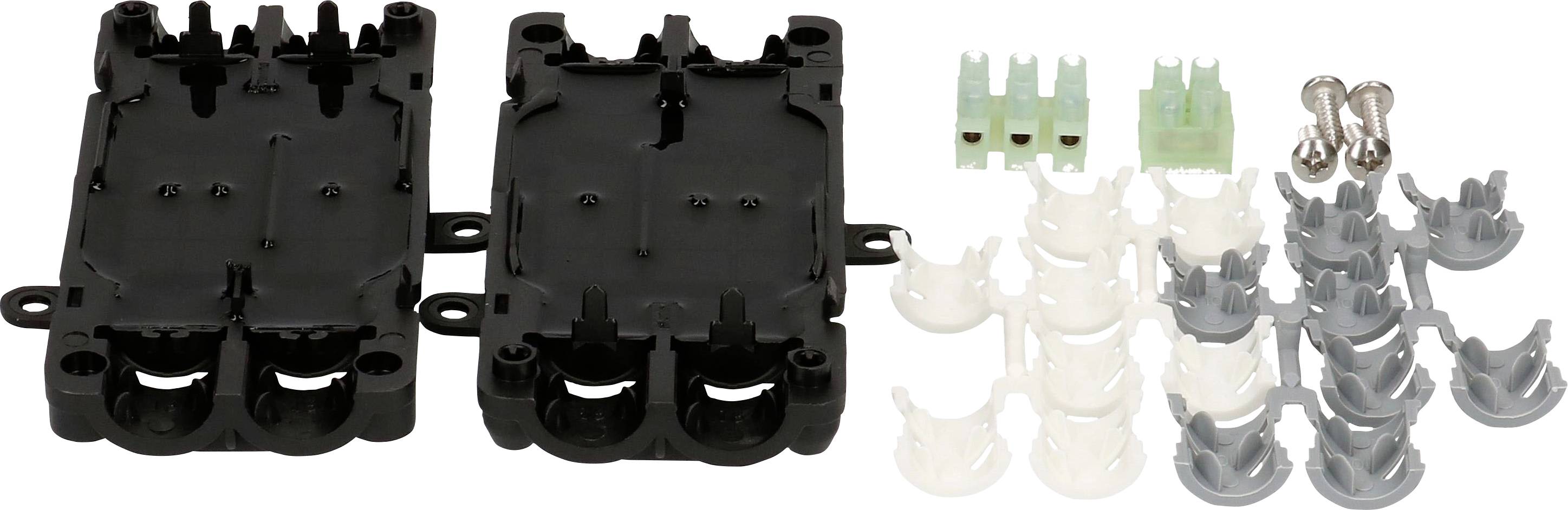 Divers composants et vis sur un fond blanc, comprenant des supports en plastique noir et des clips de couleur, probablement destinés aux installations électriques.