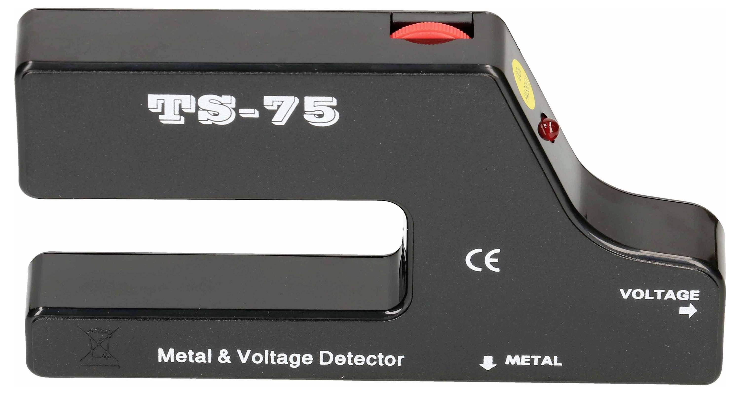 Détecteur de métal et de tension noir avec l'inscription 'TS-75'. Dispose d'un indicateur de tension et de métal avec un bouton rotatif rouge.