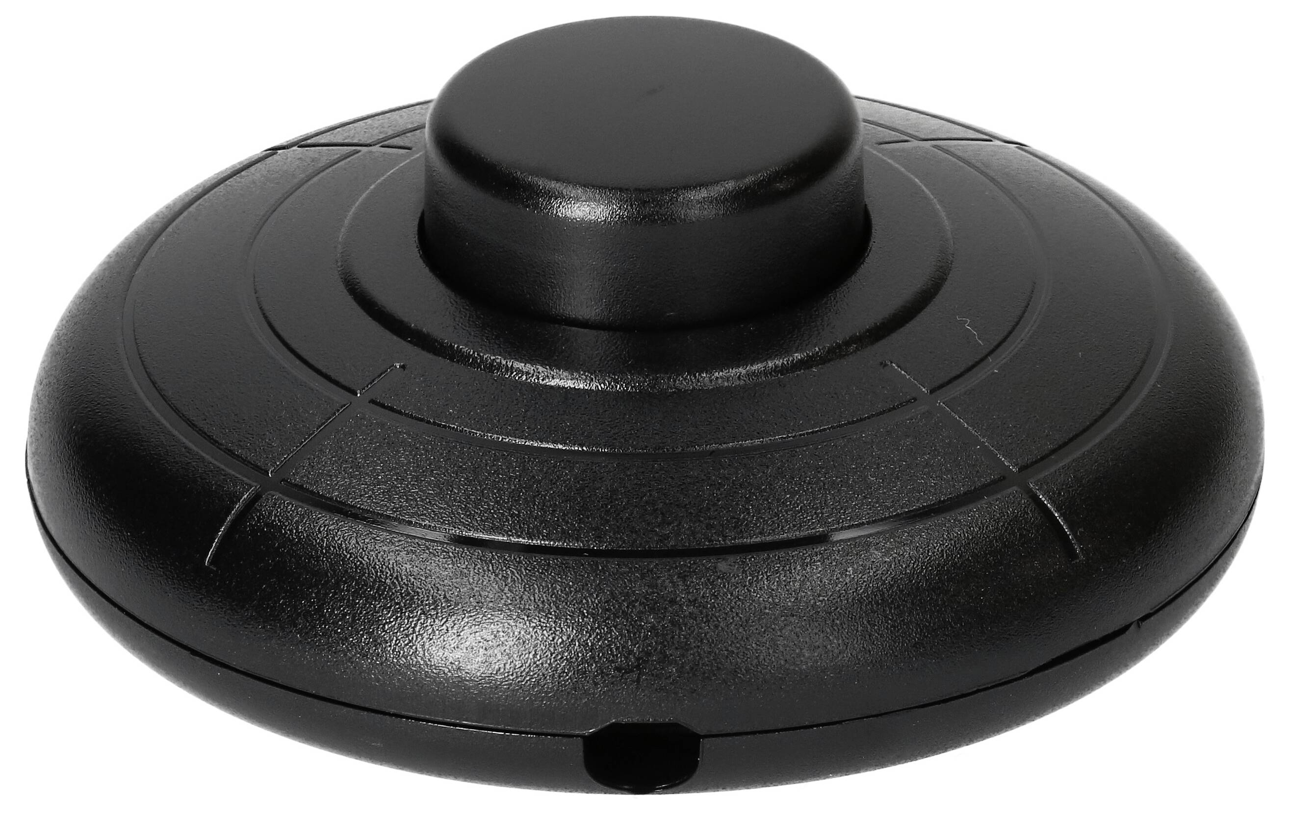 Un tag RFID de sécurité ou d'alarme noir, rond, avec une zone centrale surélevée.