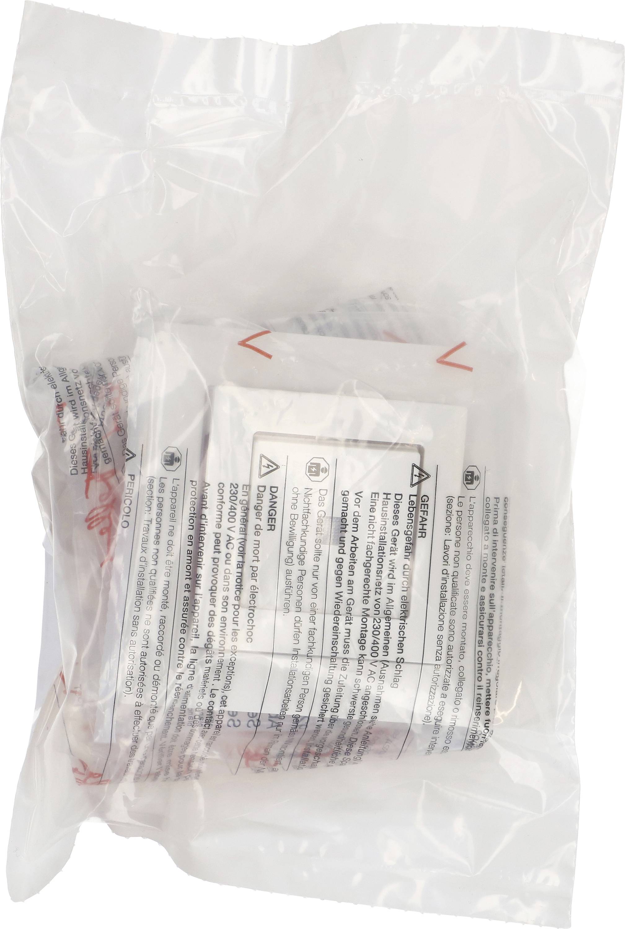 Paquet soudé contenant plusieurs sachets scellés, affichant des avertissements de sécurité et le logo d'un produit.