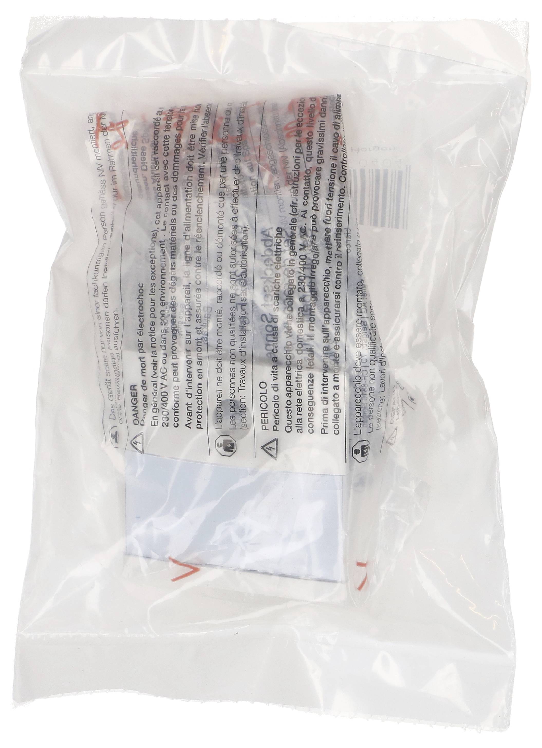 Un sac en plastique transparent et fermé, portant un texte imprimé et contenant un emballage à l'intérieur.