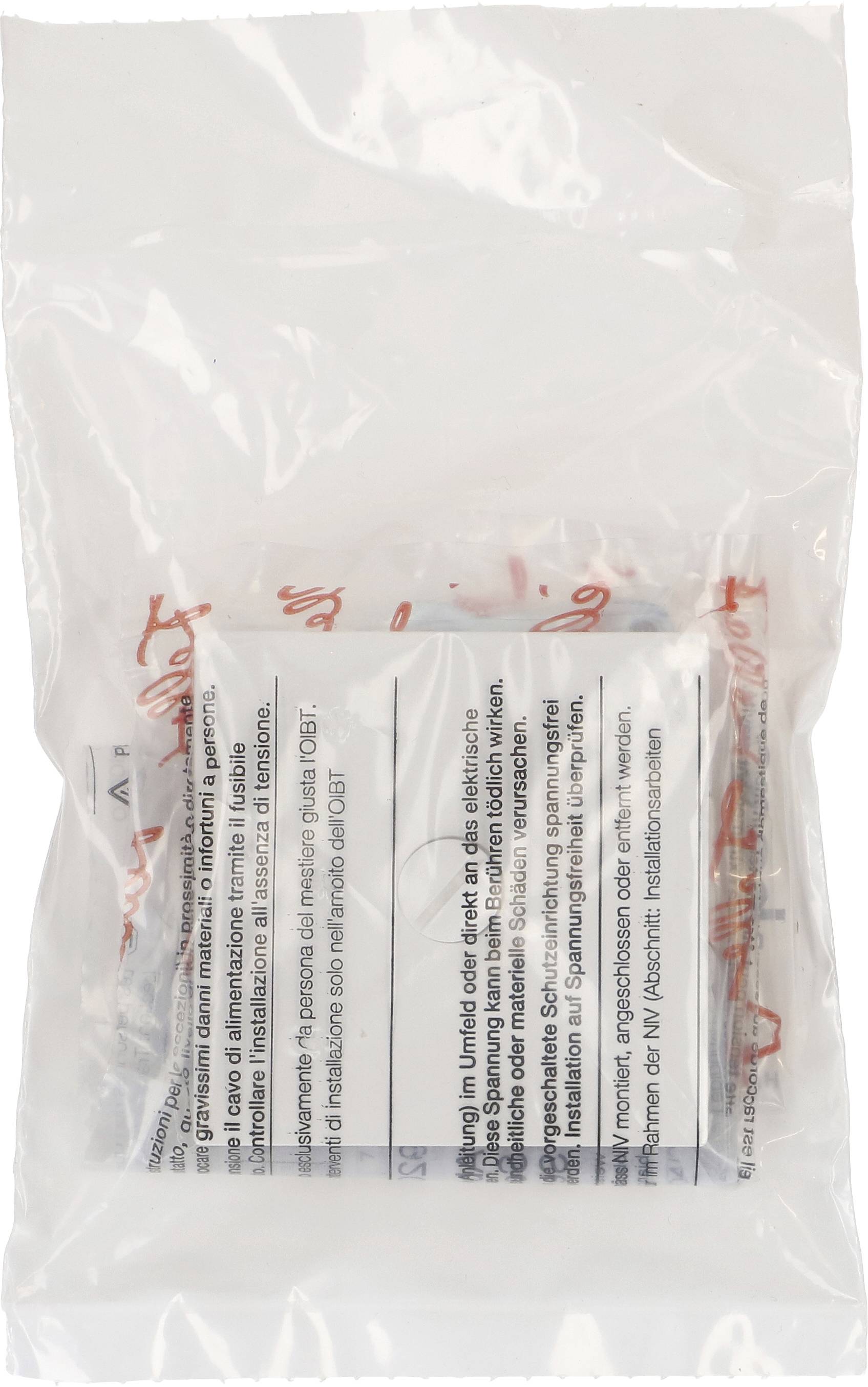 Un sac en plastique scellé contient un sachet avec un avertissement imprimé et des instructions pour une manipulation en toute sécurité.