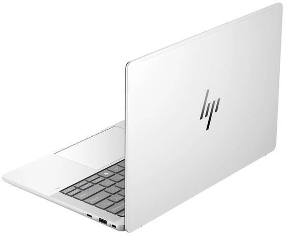Un ordinateur portable argenté vu de profil avec son couvercle ouvert. Un logo stylisé est visible à l'arrière.