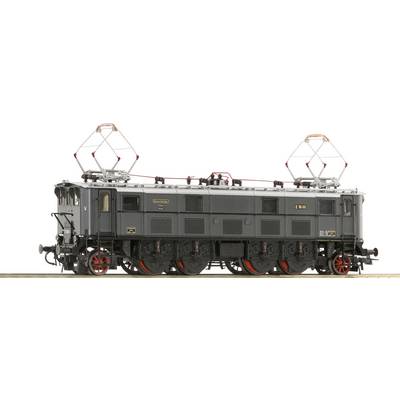 Une locomotive électrique historique à deux pantographes et wagons noirs est stationnée sur les rails, avec des détails fins visibles.
