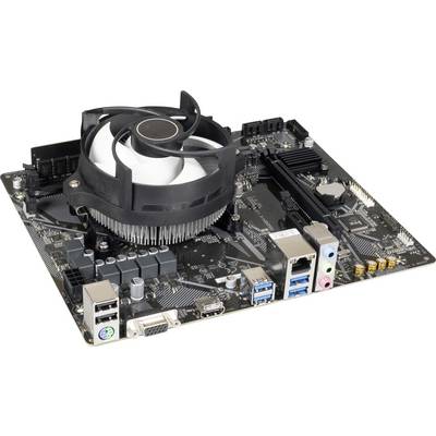 Carte mère d'un ordinateur avec ventilateur et différents ports, notamment USB, HDMI et Ethernet, placée sur une table.
