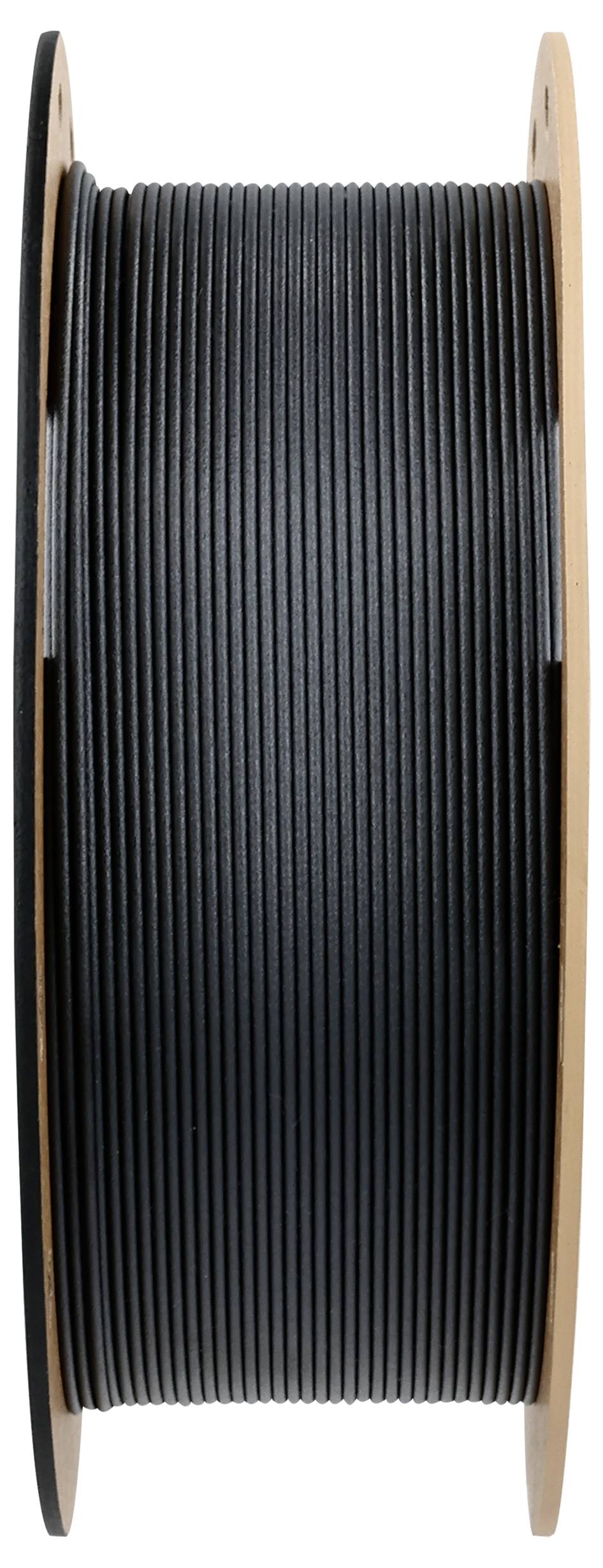 Bobine de filament noir pour imprimante 3D, enroulée sur une bobine en bois.