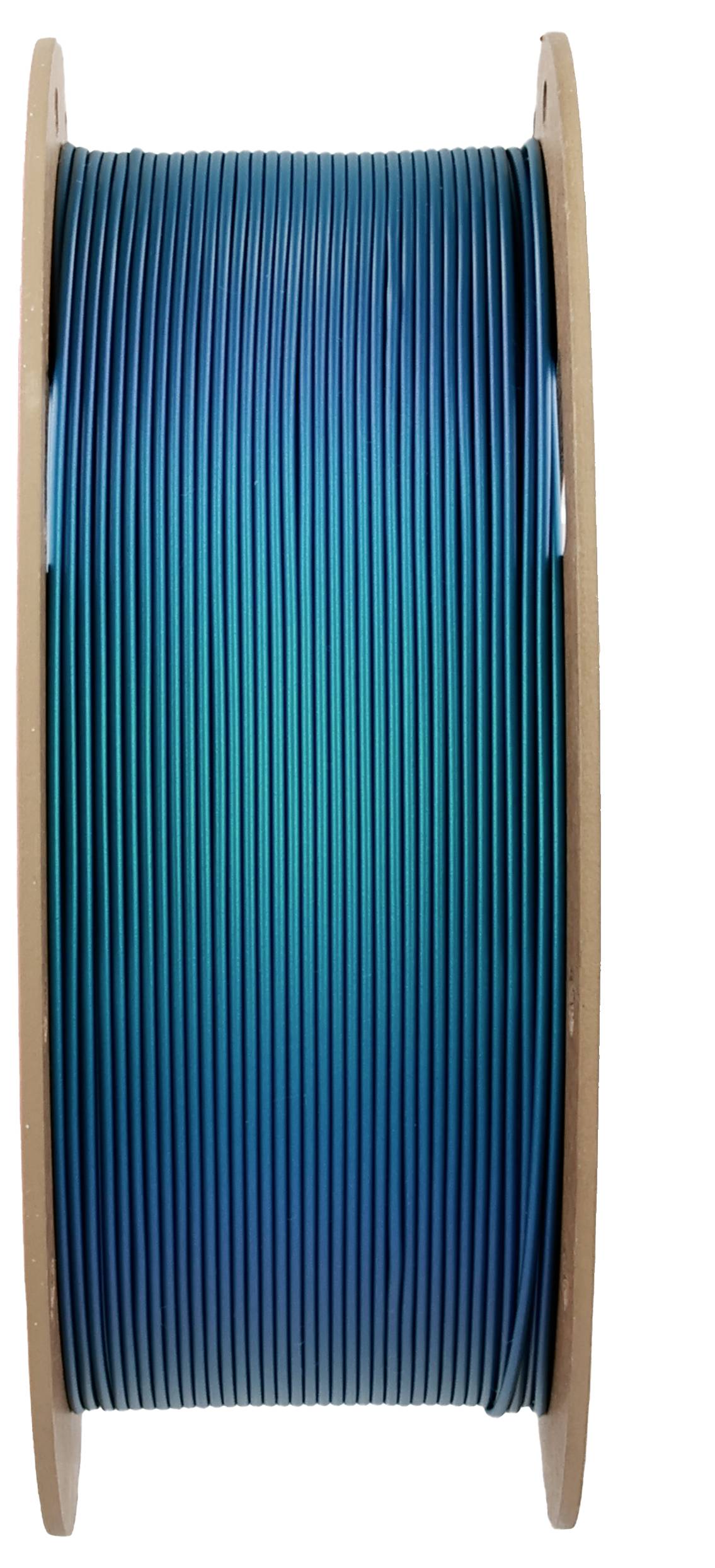 Bobine en plastique avec filament d'imprimante 3D bleu-vert, positionnée verticalement, sur fond blanc.