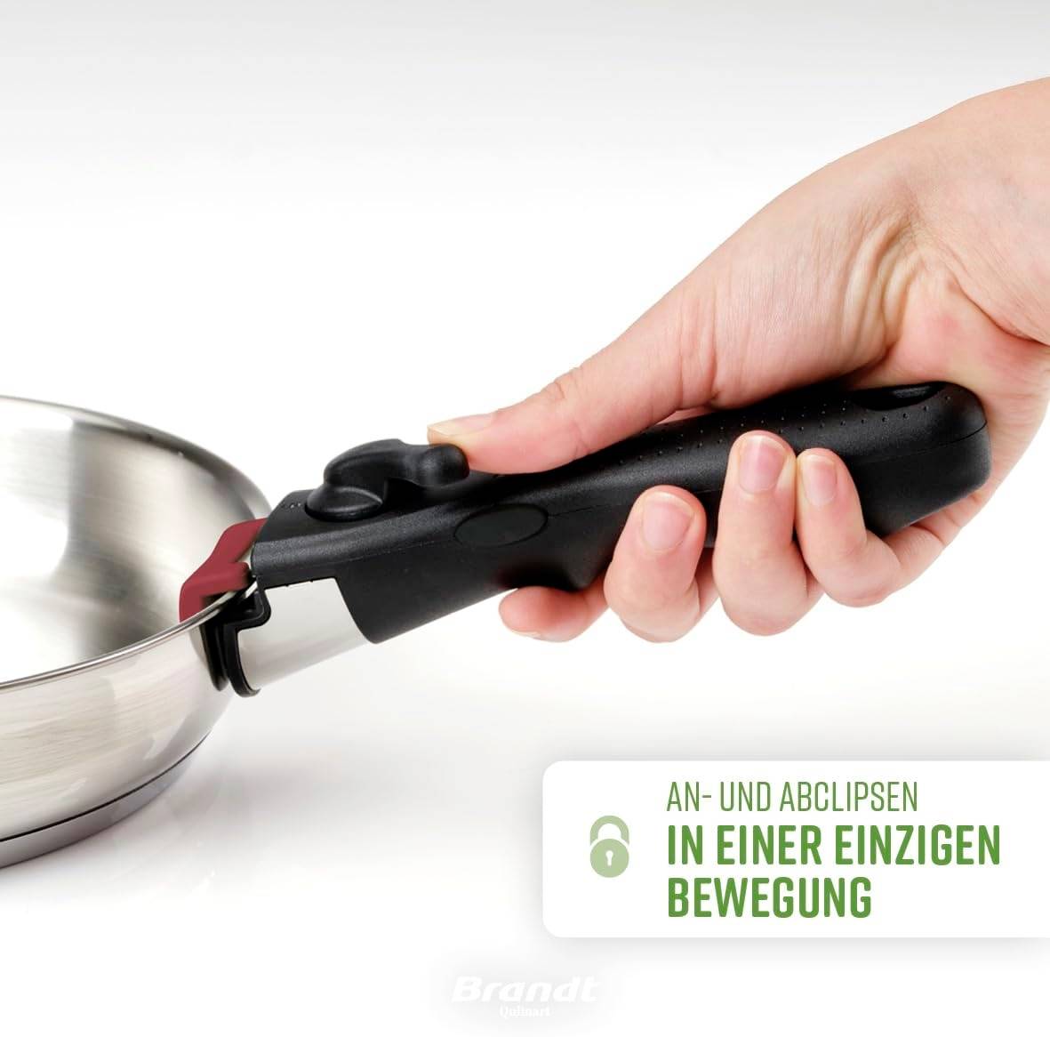 Une main tient une poignée de casserole séparée, qui est fixée à une casserole en acier inoxydable. Texte : 'Clipser et déclipper en un seul mouvement'.