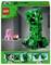Set LEGO à thème Minecraft : Grand Creeper vert à côté d'un cochon rose et d'un cube de TNT. L'emballage montre les instructions de montage étape par étape.