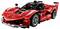'Petite voiture de sport rouge fabriquée à partir de blocs de construction emboîtables, présentant des éléments de design détaillés tels que des rétroviseurs latéraux, des roues et un aileron arrière.'