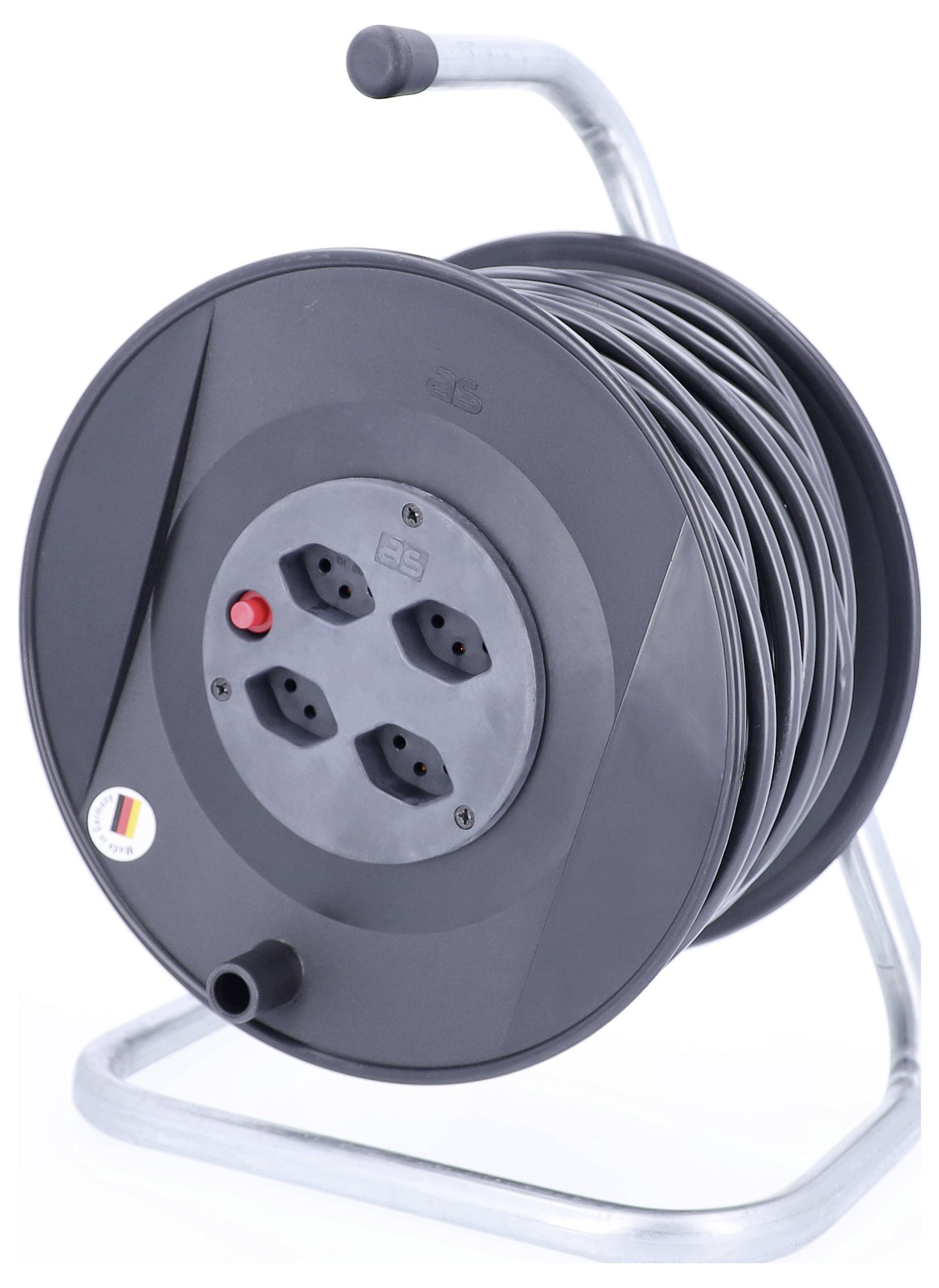Un enrouleur de câble noir avec quatre prises électriques, un bouton rouge et un long câble enroulé sur un support métallique.