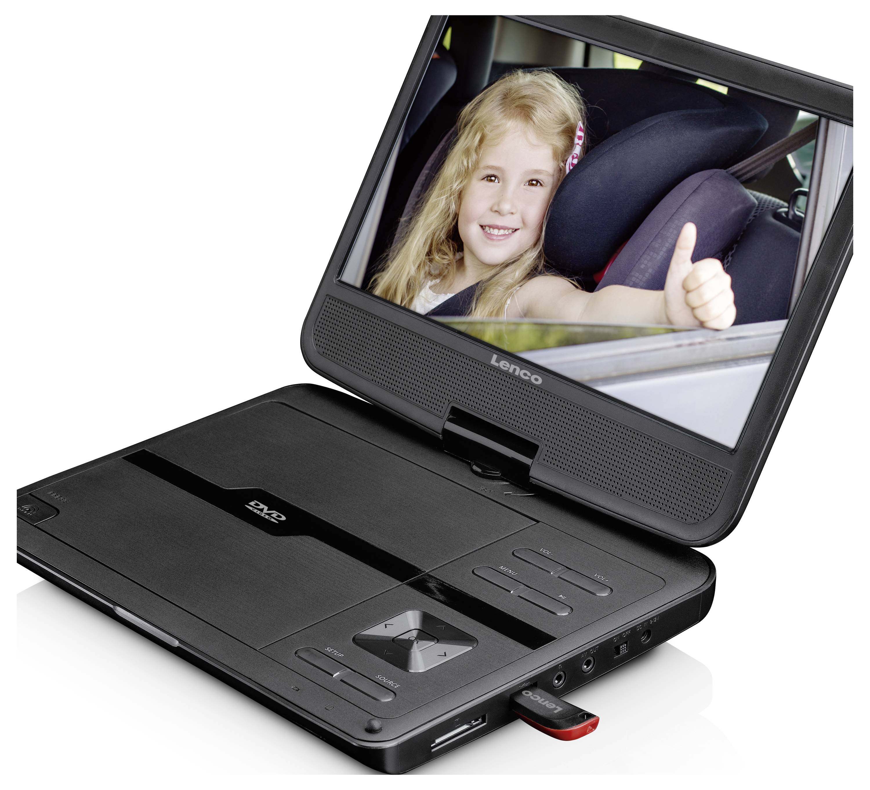 Un lecteur DVD portable posé sur une table montre un enfant souriant assis dans une voiture et faisant un pouce levé.