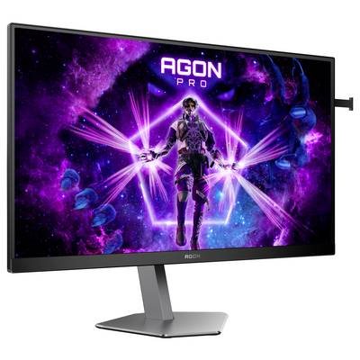 Un écran affiche une figure futuriste avec des effets lumineux sur un fond noir et violet, portant le texte 'AGON PRO'.