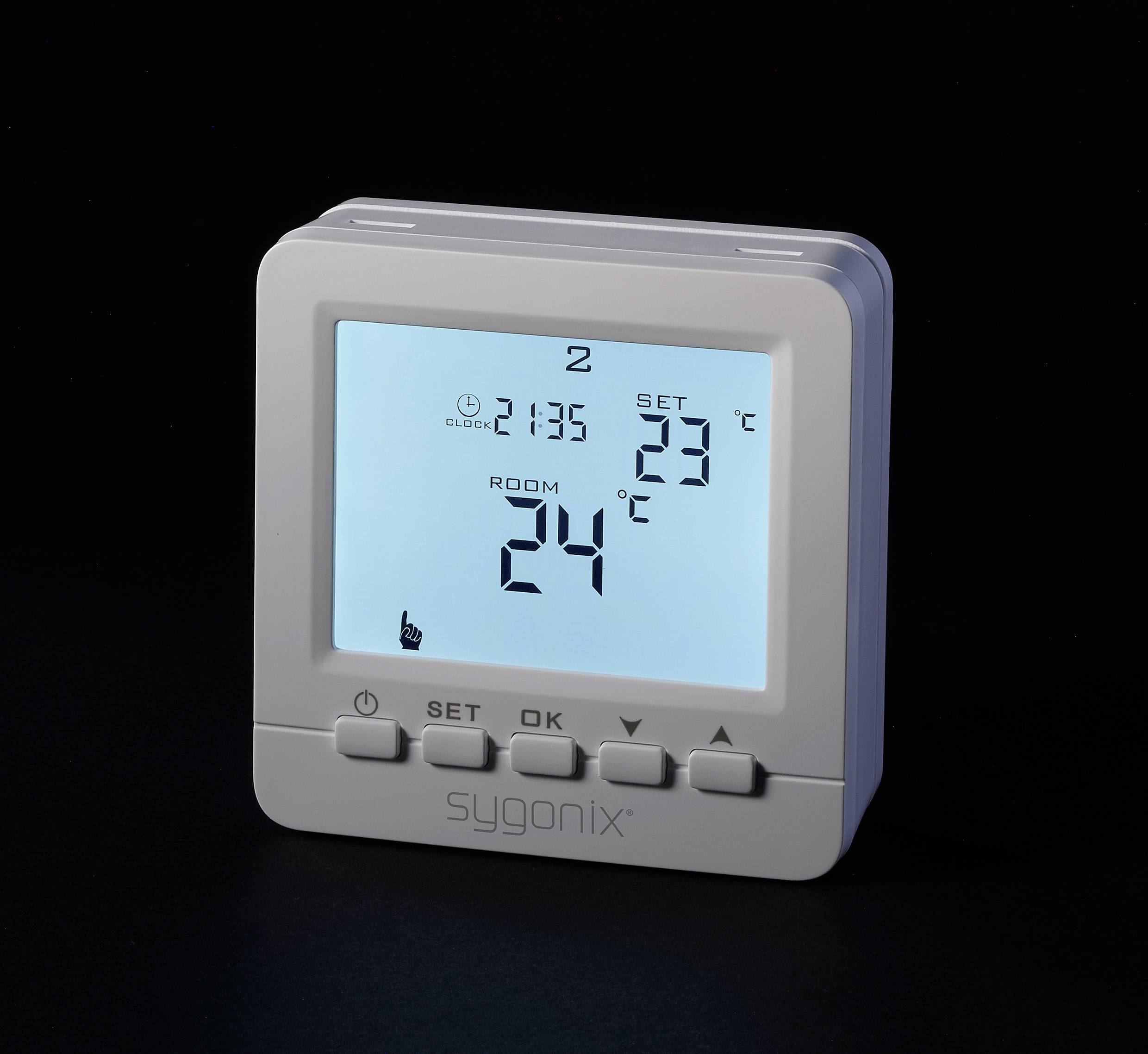 Un thermostat numérique affichant une température ambiante de 24°C et une température de consigne de 23°C. L'heure est 21:35.