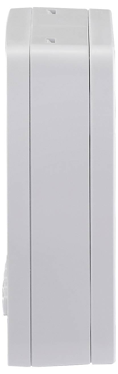 Vue de côté d'un appareil rectangulaire blanc, probablement un thermostat ou un dispositif similaire fixé au mur, montrant sa profondeur et son design plat.