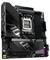 Une carte mère noire avec l'inscription 'AORUS' et un socle de processeur AMD Ryzen. Les composants détaillés sont visibles.