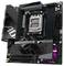 Une carte mère 'Gigabyte B650M Aorus Elite AX' avec un socket pour processeur AMD, des emplacements RAM et plusieurs connecteurs.