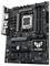 Une carte mère ASUS TUF Gaming avec plusieurs emplacements PCIe, banques de RAM et un socket processeur. Elle présente des connecteurs et des composants électroniques.