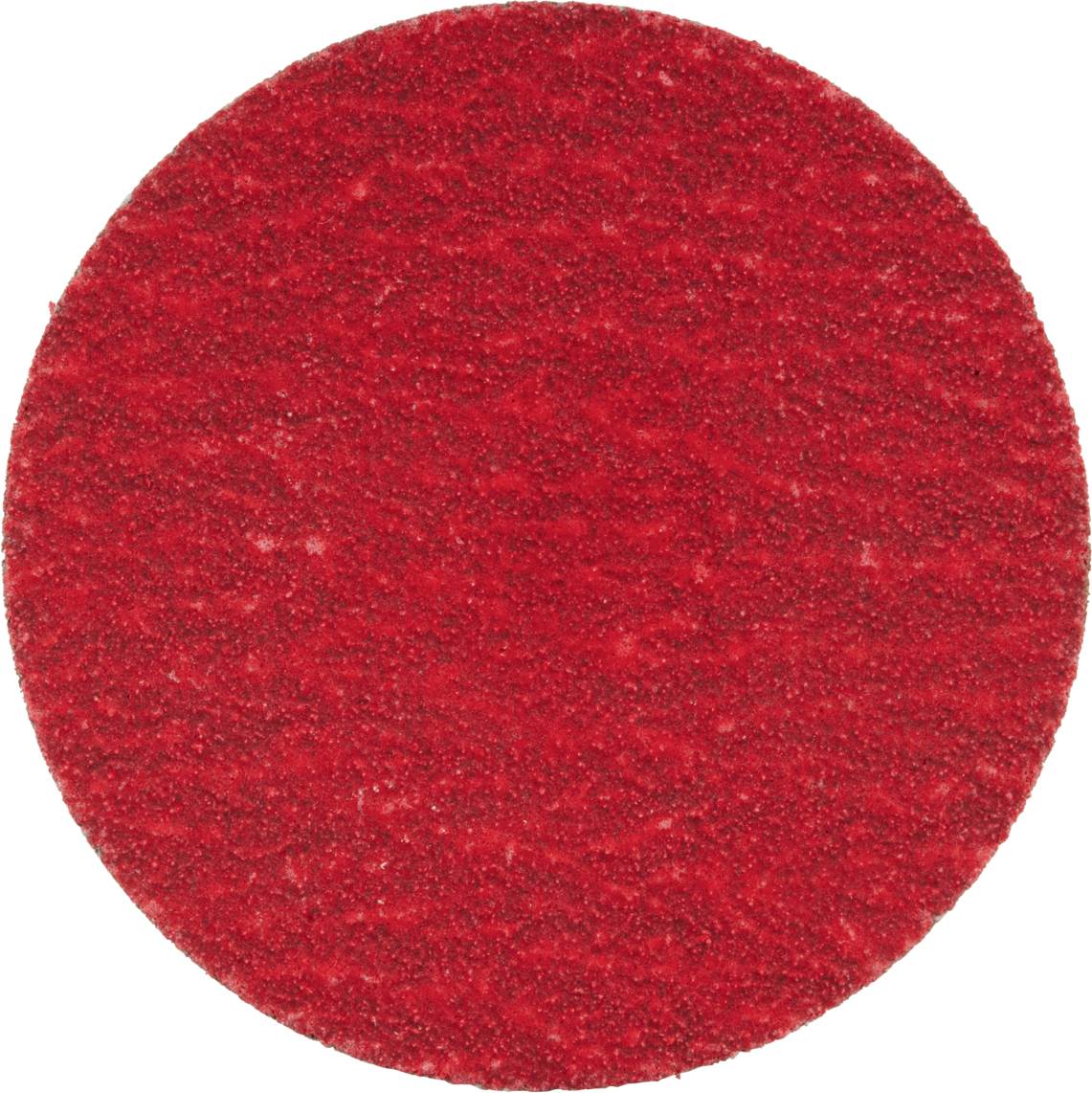 Un tampon de ponçage rond, rouge, à surface rugueuse.