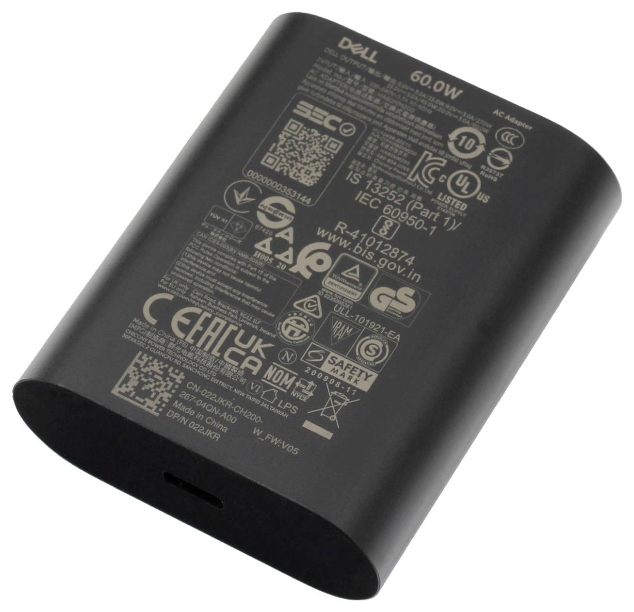Un adaptateur secteur pour ordinateur portable Dell de 60 W avec divers logos de sécurité et de certification sur sa surface.