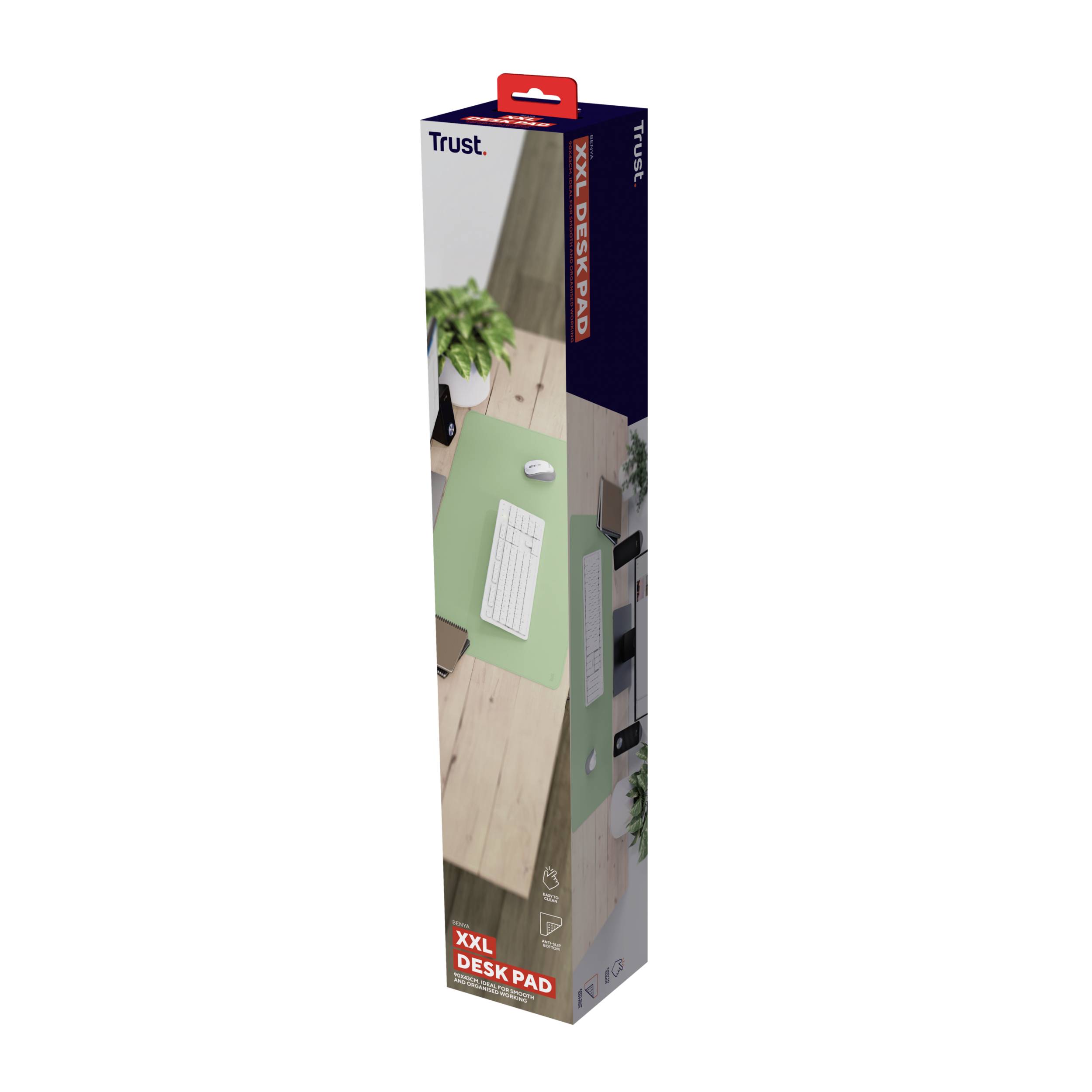 Emballage d'un tapis de souris de la marque 'Trust' : Taille XXL, image d'un tapis vert sur un bureau avec un clavier et une souris.