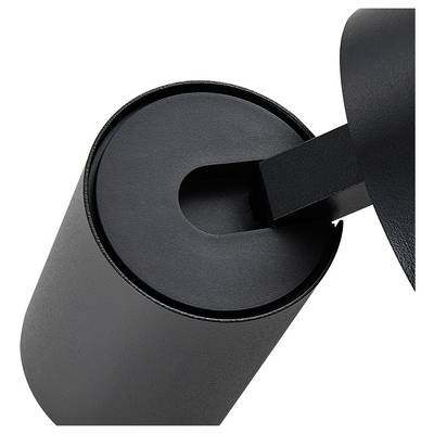Récipient cylindrique noir avec couvercle, partiellement ouvert.