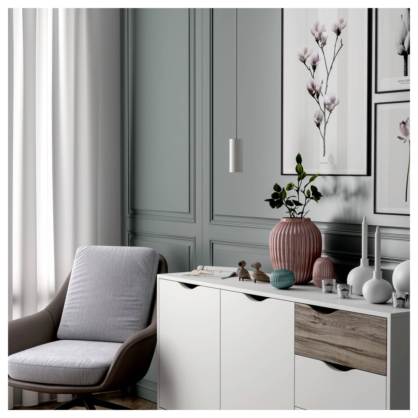 Coin de salon moderne avec un fauteuil gris, un meuble de rangement blanc, un vase rose orné de fleurs et des tableaux floraux encadrés accrochés près d'une fenêtre.